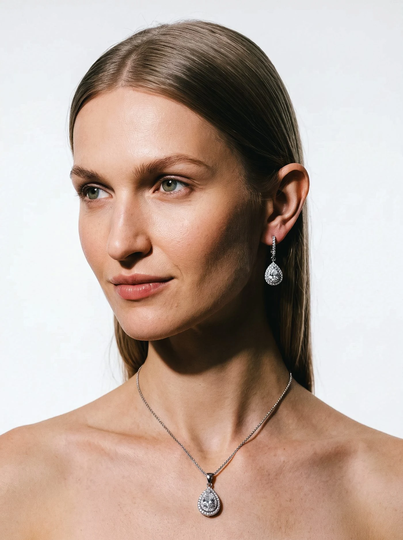 Halo Earrings, No. 004, and Halo Pendant, No. 005, worn together